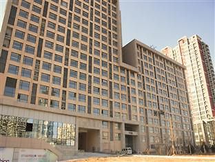 تشينغداو Sweetome Vacation Rentals Pollex Plaza المظهر الخارجي الصورة